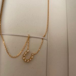 K18 2.5 grams horseshoe with diamonds